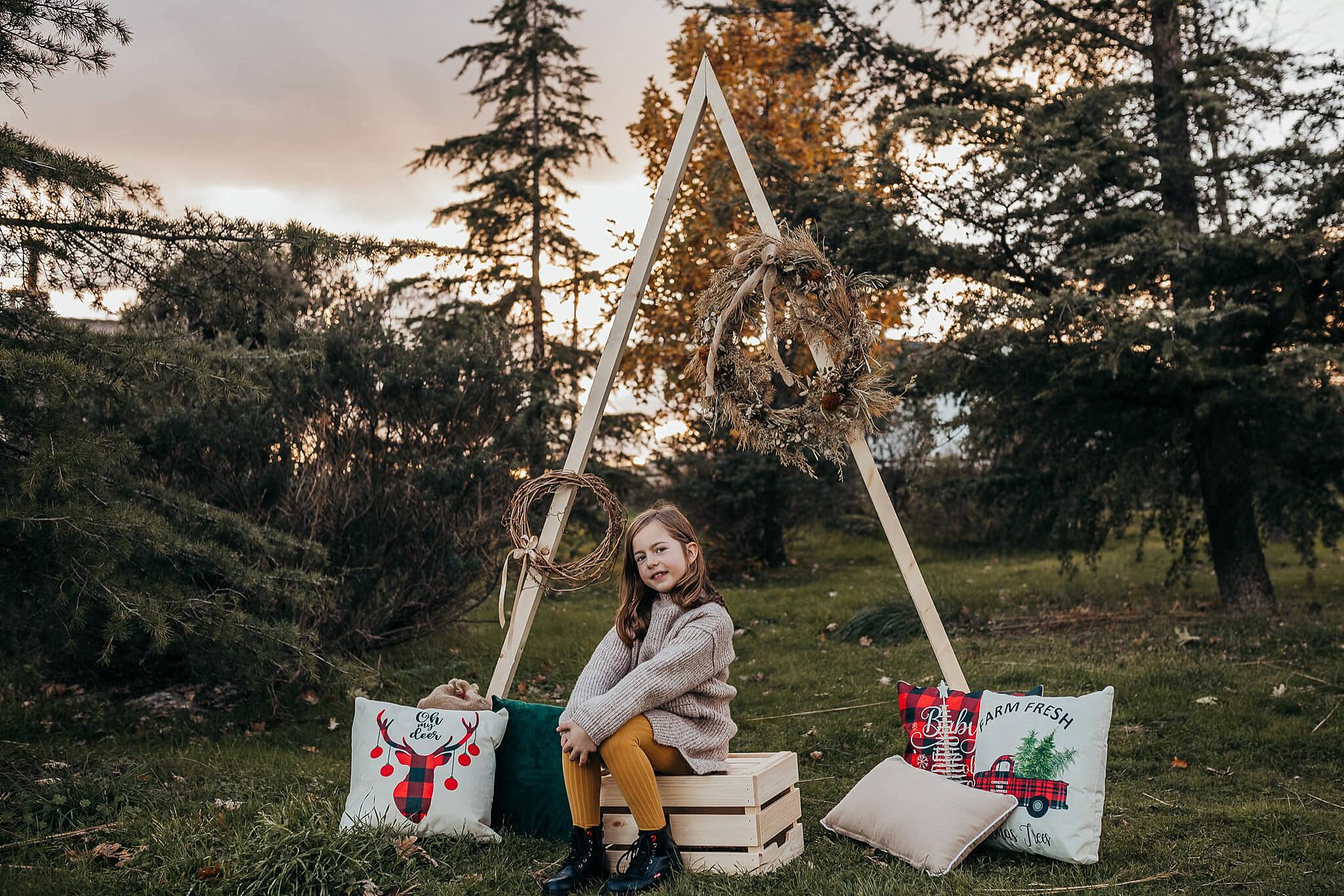 Sesiones de fotos de Navidad entre los pinos